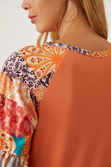 Printed Round Neck Peplum Blouse